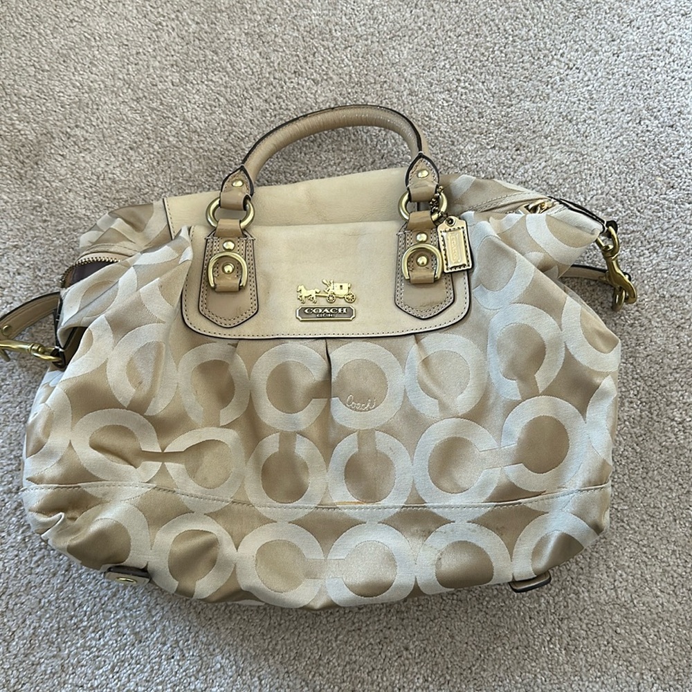 Gold and tan Coach purse